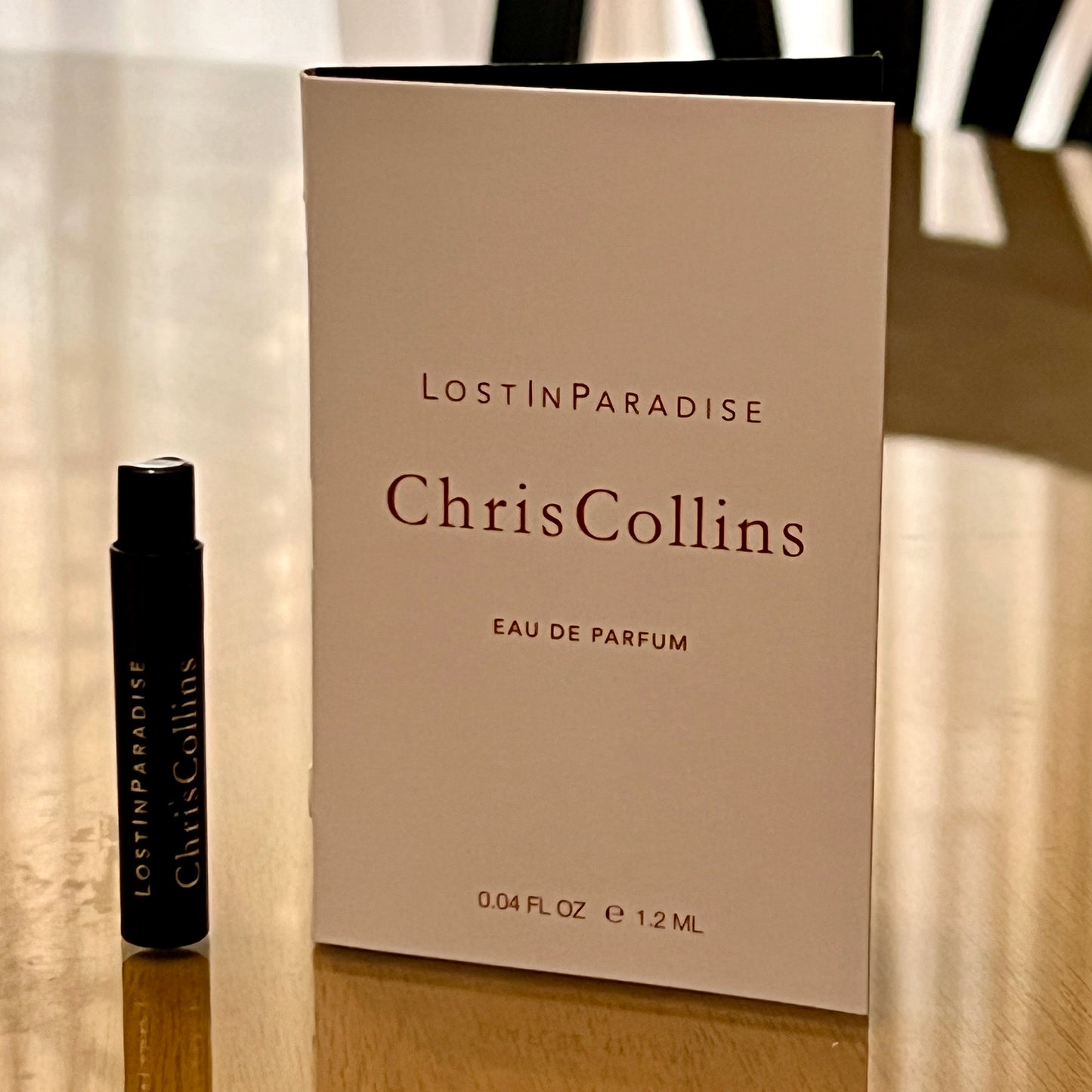 World of Chris Collins Lost in Paradise Eau de Parfum vial